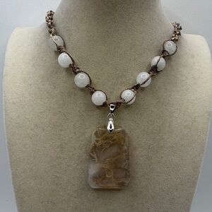 Handmade Hemp Necklace with a Moss Agate Pendant and White Jade Beads